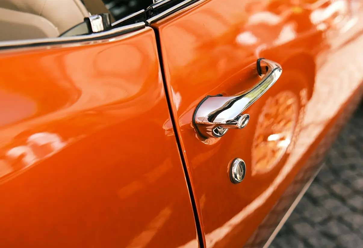 Paint correction — polisher restoring deep gloss finish